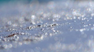 Soyut makro fotoğrafçılık. Çelik bir yüzeyde metalik bokeh ışığı