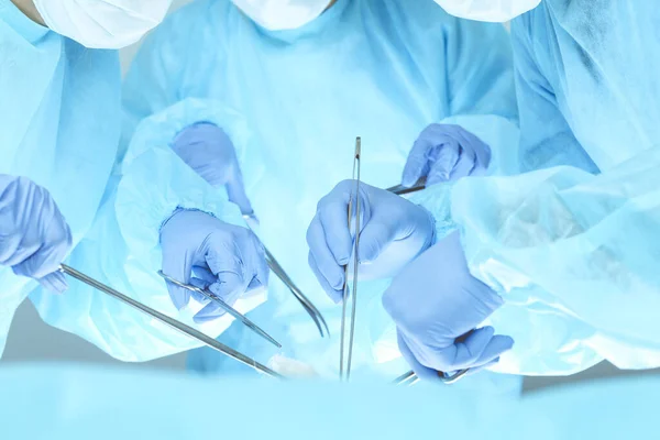 A group of surgeons is operating at the hospital. Health care concept — Stock Photo, Image