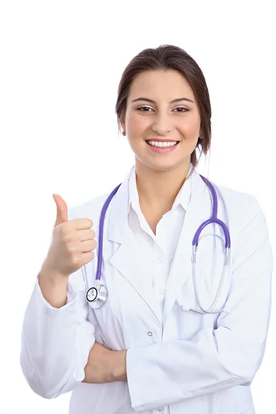 Amigável sorridente jovem médico mostrando área copyspace, isolado Imagem De Stock