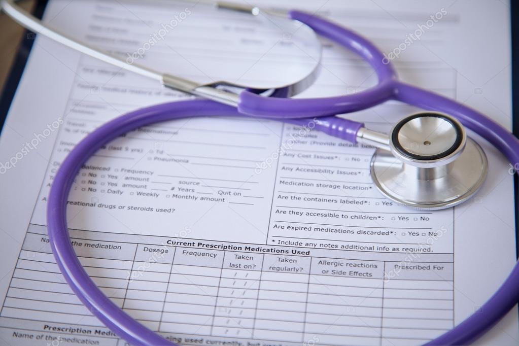 Purple Stethoscope On The Glass Desk Stock Photo C Rogerphoto