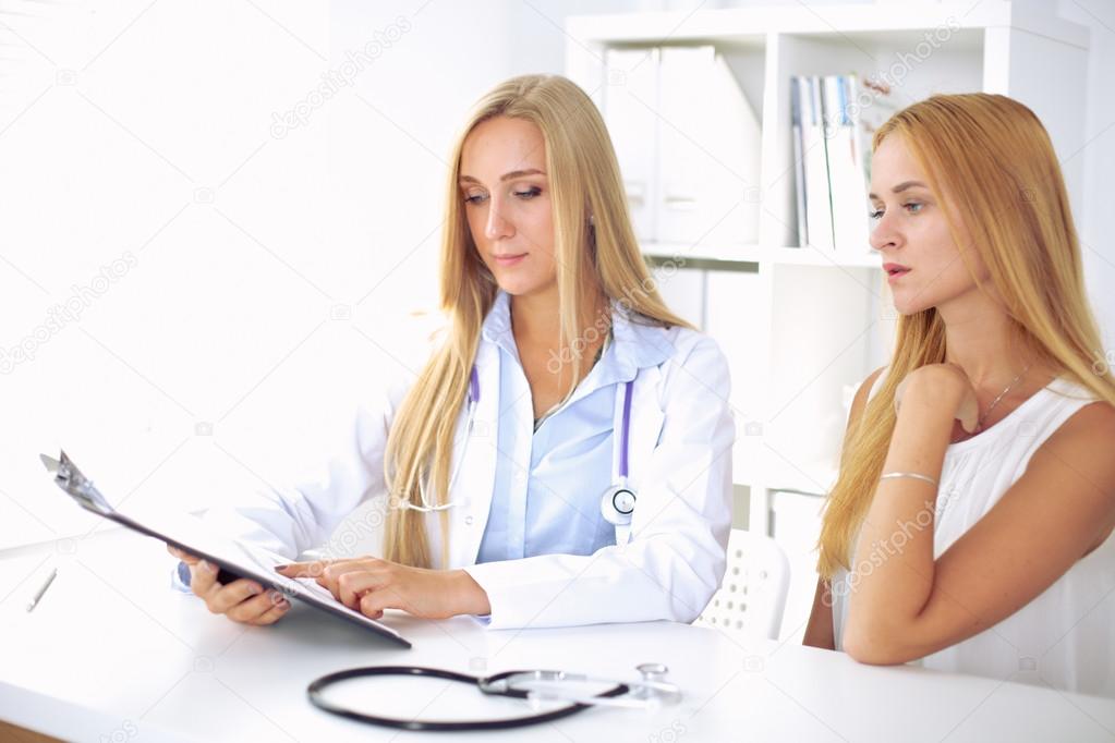 Doctor with patient in hospital
