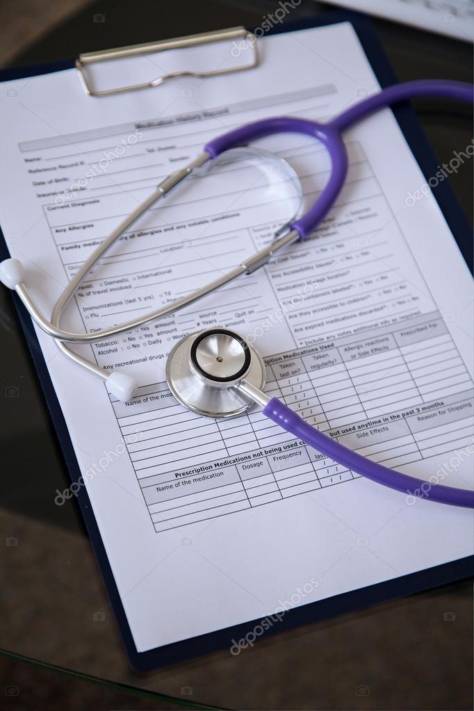 Purple Stethoscope On The Glass Desk Stock Photo Rogerphoto Purple Stethoscope On The Glass Desk Stock Photo