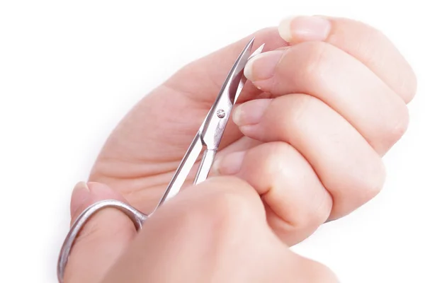 Manicure knippen van de nagels van de hand — Stockfoto