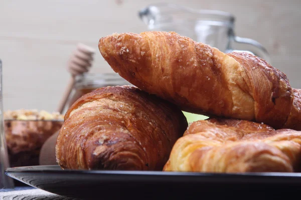 Croissants for breakfast in the pot — Stock Photo, Image