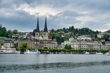Lucerne, Switzerland- May 20, 2019- Scenic view of Alps from Lake lucerne and a view of old town of Lucerne in in Switzerland
