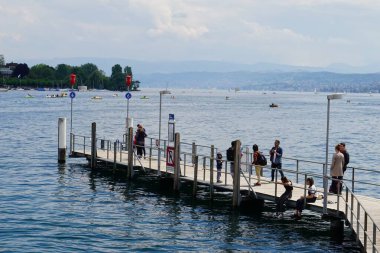 Zurich,Switzerland_May 25,2019: Tourist waiting to board a ferry for a ride in lake Zurich
