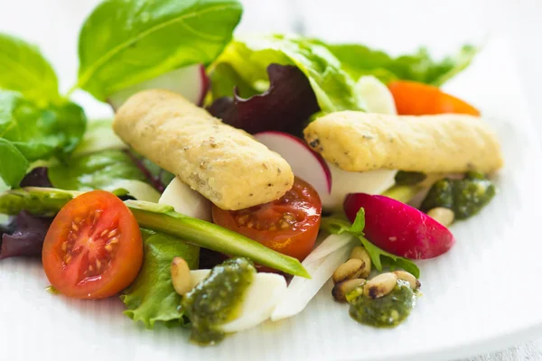 Summer leaf salad on a wooden background — Stock Photo, Image