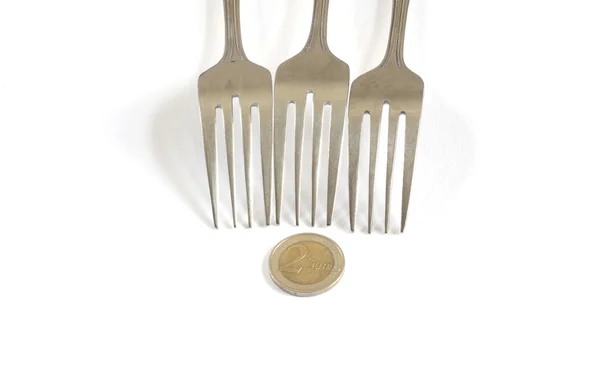 Money euro cents and dining fork to eat — Stock Photo, Image