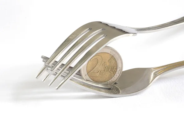 Dinero céntimos de euro y tenedor para comer — Foto de Stock