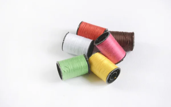 Sewing thread on the table — Stock Photo, Image