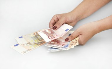 euro banknot ile el