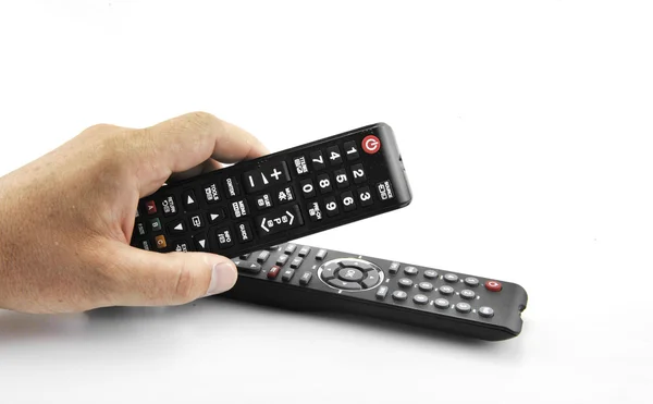 Hand with remote control pointing forward isolated at white — Stock Photo, Image