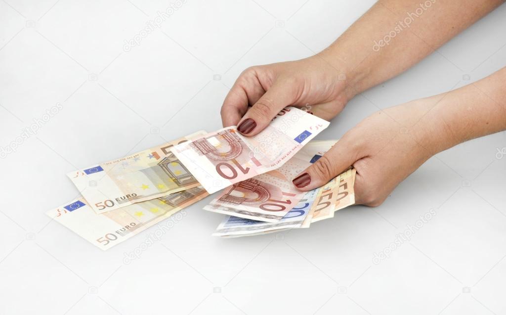 hands with euro banknotes