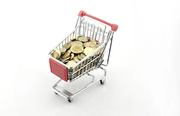 Shopping cart with coins — Stock Photo, Image