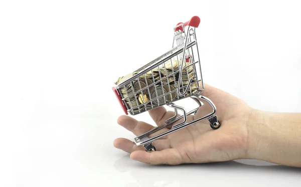 Shopping cart with coins — Stock Photo, Image