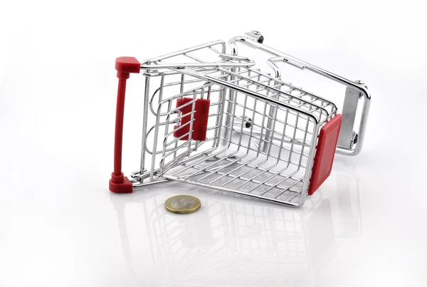 Carrito de compras con monedas — Foto de Stock