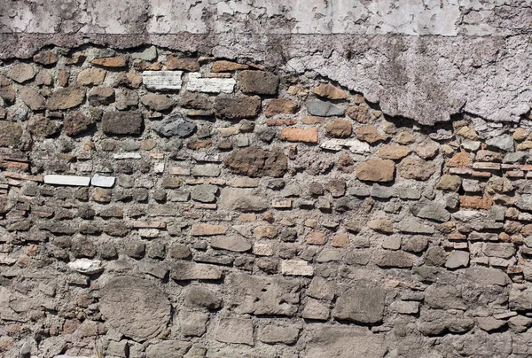 石からアンティークの織り目加工の壁 — ストック写真