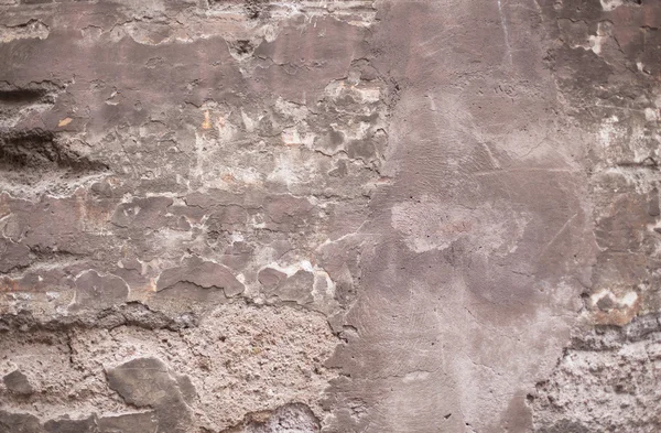 从石头在罗马古董斑驳的墙 — 图库照片