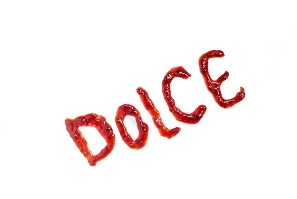 Italian word dolce (sweet) spelling with jam — Stock Photo, Image