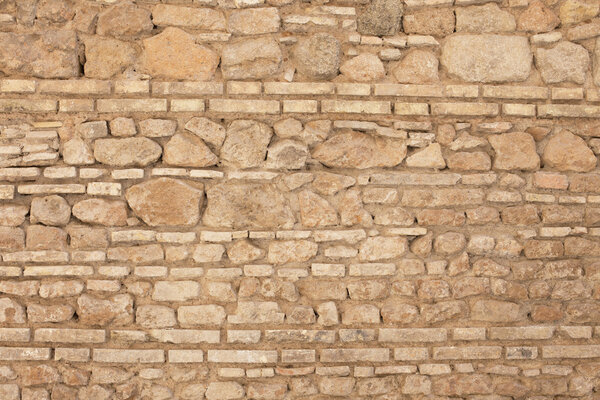 Antique textured wall from bricks