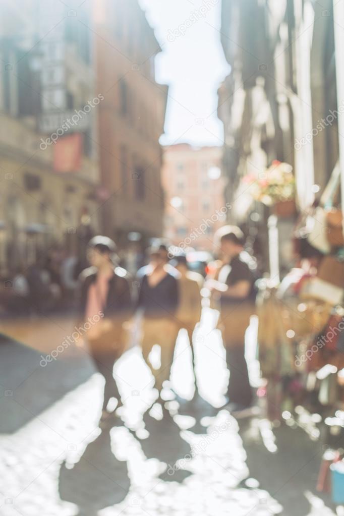 Blurred crowd of walking people in Rome, Italy