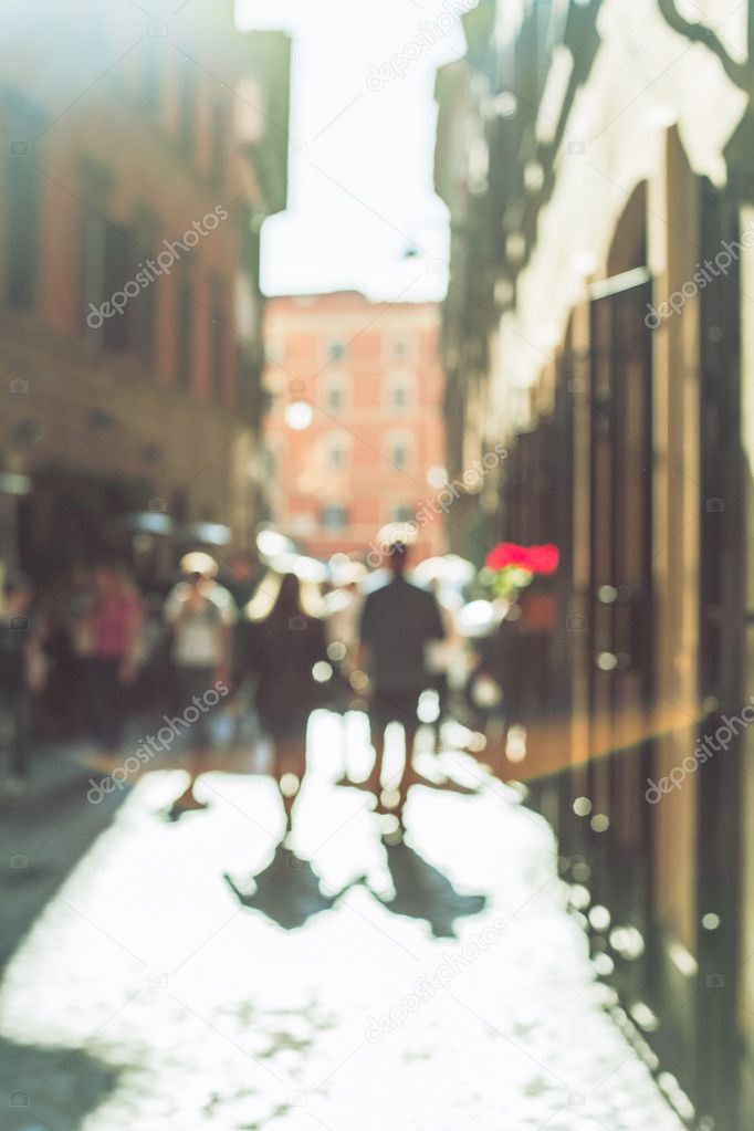 Blurred crowd of walking people in Rome, Italy