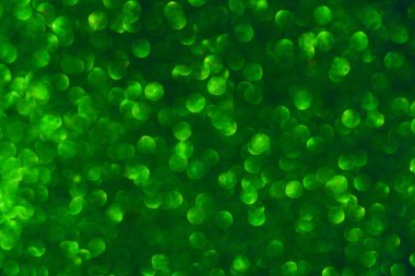 yeşil parıltılı doku arka planı. Seçici odak.