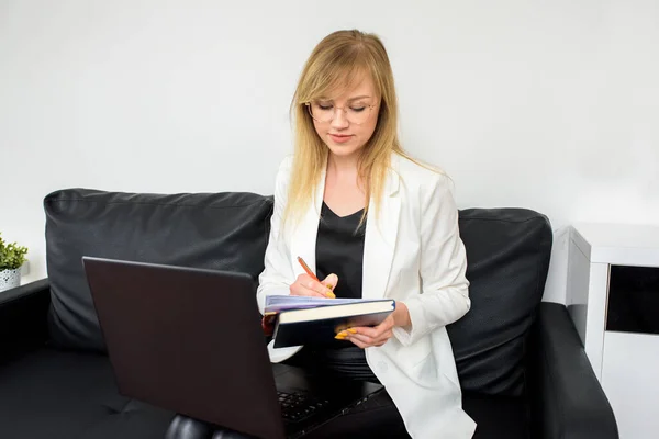 online consultation of lawyer, accountant.businesswoman working on laptop, successful confident executive manager sitting at office, young business owner posing at work