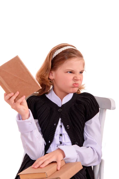 Portrét školačka s knihou nezajímavá — Stock fotografie