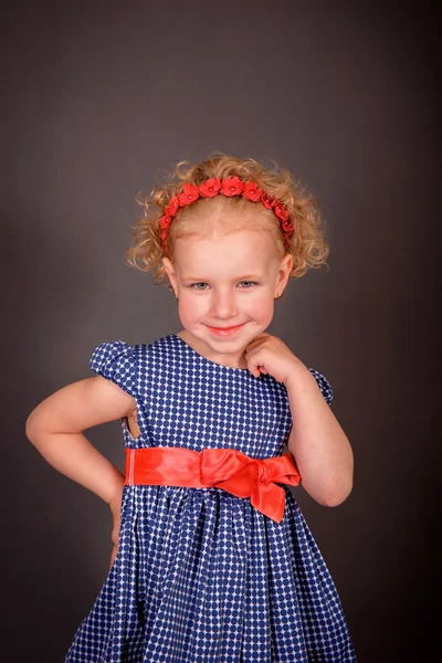 Emotional portrait of a cheerful blonde curly. — Stock Photo, Image