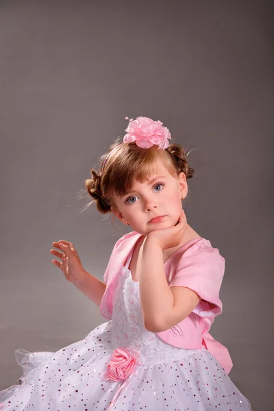 Portrait of a cute red-haired girl with blue eyes. — Stock Photo, Image