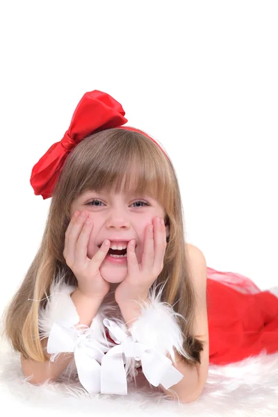 Emotional portrait of a cheerful girl in red dress isolated on white background. New Year — Stock Photo, Image