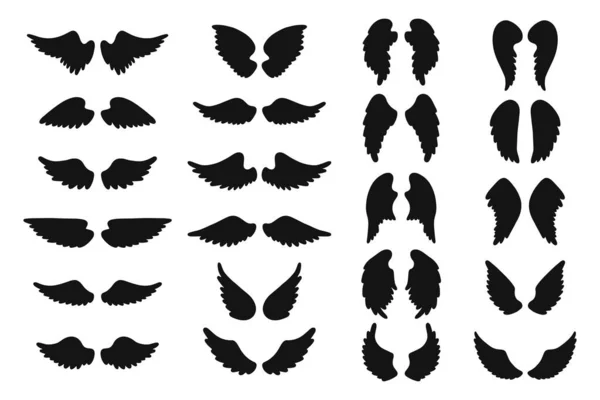 Set of hand drawn angel or bird wings silhouettes. Monochrome drawing elements. — Stock Vector