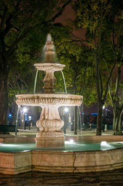 Night view of the fountain in the So Pedro de Alcntara garden, next to the viewpoint, in Lisbon, Portugal