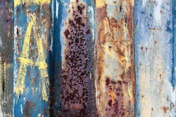 red rusted on the color metal wall with planks. background and Texture for your design.