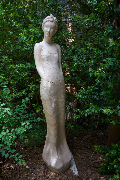 Eze, France - June 17, 2021 - the exotic garden of Eze with statues of splendent women                                