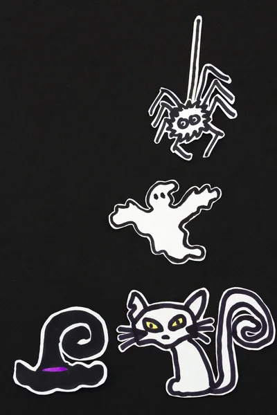 Halloween decoraties kat, heks hoed, geest en spin — Stockfoto