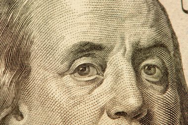 portrait of Franklin on a $ 100 bill, close-up, selective focus. Author of the aphorism 