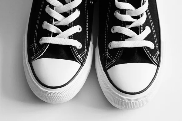 New black sneakers isolated on white — Stock Photo, Image