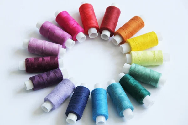 Sewing colored threads — Stock Photo, Image
