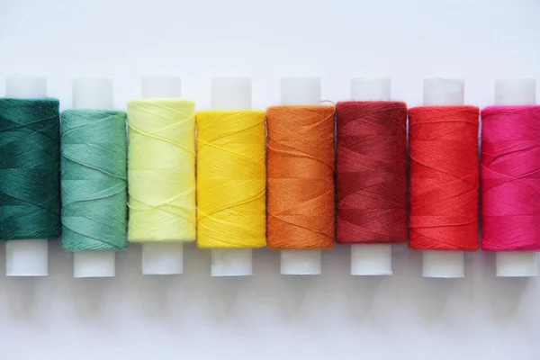 Sewing colored threads — Stock Photo, Image