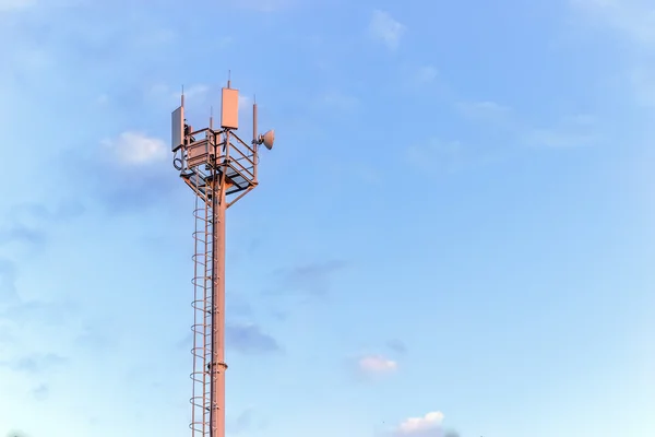 Cell Phone Tower on blue sky — Stock Photo, Image