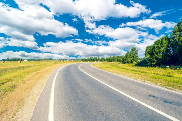 Asphalt Road Leading Distance Bend Royalty Free Stock Photos