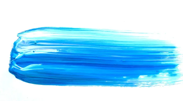 Мазки кисти с синей краской на белом изолированном фоне. — стоковое фото