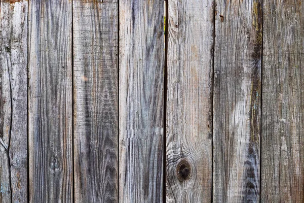 Oude houten grijze muur achtergrond of textuur. — Stockfoto