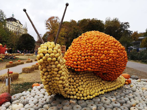 Ludwigsburg, Germany - October 27,2018 : The Big snail in pumpkin garden has a theme represented in pumpkin art in World's largest pumpkin festival. 