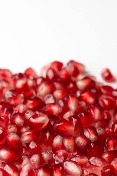 Beyaz arka plan Punica granatum nar tohumları