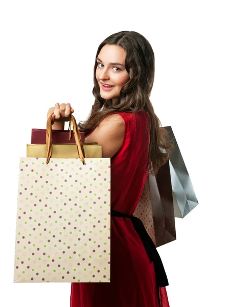 Giovane donna sorridente con borse della spesa — Foto Stock