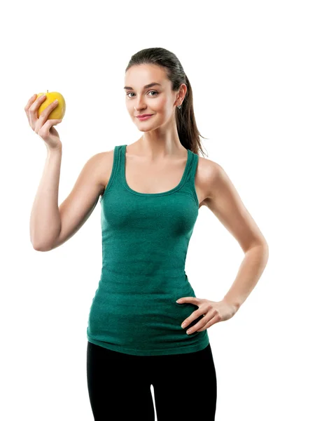 Hermosa mujer deportiva con manzana — Foto de Stock