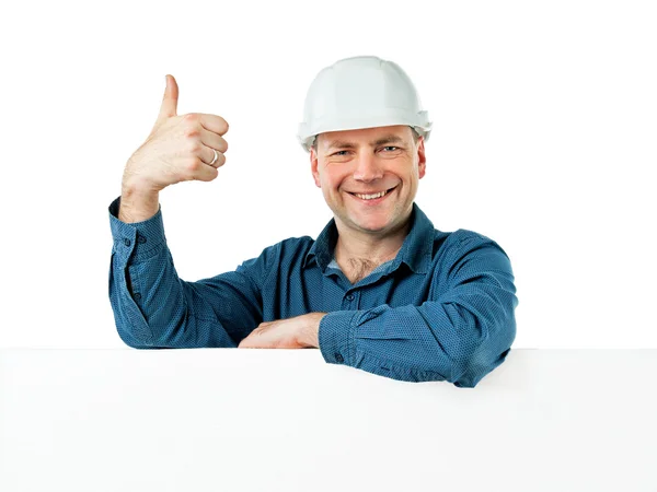 Άνθρωπος στην κατασκευή κράνος δείχνει χειρονομία Ok — Φωτογραφία Αρχείου